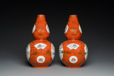 A pair of Chinese coral-ground famille rose double gourd vases, Qianlong mark, Republic