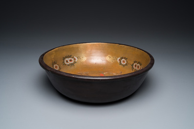 A large Chinese Fuzhou or Foochow lacquer 'tiger' bowl, inscribed 'xin qi chun', 19/20th C.