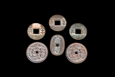 Five Chinese bronze coins and a Japanese coin, possibly Qin and later