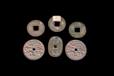 Five Chinese bronze coins and a Japanese coin, possibly Qin and later