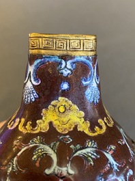 A square Chinese Canton enamel vase with Europeans, Qianlong mark and probably of the period