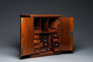 A Chinese huanghuali and hardwood cabinet with bronze fittings for the European market, 19th C.