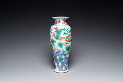 A Chinese wucai 'qilin and phoenix' vase, Transitional period