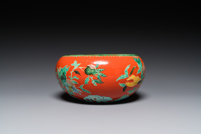 A Chinese relief-decorated alms bowl with wooden lid, Qianlong mark, 19/20th C.