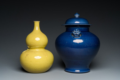 A Chinese monochrome yellow double gourd vase and a blue vase and cover, Republic
