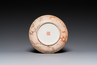 A Chinese faux-marble painted porcelain plate with a poem and Tang Ying mark, Qianlong mark, 19th C.