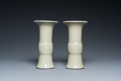 A pair of Chinese celadon-glazed 'gu' vases, 18th C.