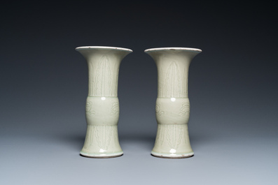 A pair of Chinese celadon-glazed 'gu' vases, 18th C.