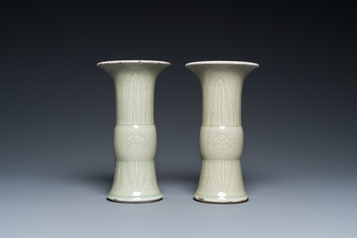 A pair of Chinese celadon-glazed 'gu' vases, 18th C.