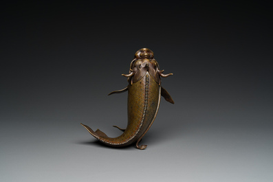 A Chinese bronze dragonfish form censer, Ming