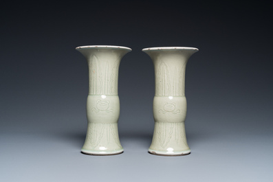 A pair of Chinese celadon-glazed 'gu' vases, 18th C.