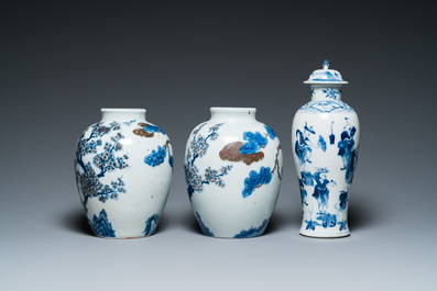 A pair of Chinese blue, white and copper-red vases, a blue and white covered vase and a Canton famille rose box and cover, 19/20th C.