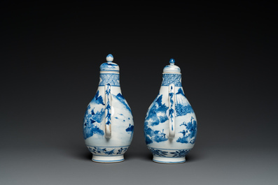 A pair of Chinese blue and white 'landscape' ewers and covers, possibly for the Vietnamese market, 19th C.