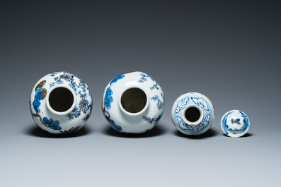 A pair of Chinese blue, white and copper-red vases, a blue and white covered vase and a Canton famille rose box and cover, 19/20th C.