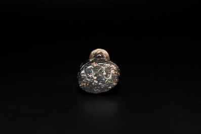 A Chinese black and grey jade figural pendant, Han Dynasty