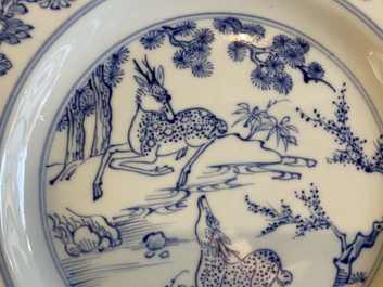 A pair of Chinese blue and white 'deer' plates, Yongzheng