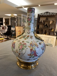 A Chinese Canton famille rose vase with gilt brass mounts, 19th C.