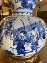 A Chinese blue and white double gourd vase mounted as a lamp, Transitional period