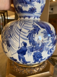 A Chinese blue and white double gourd vase mounted as a lamp, Transitional period