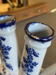 A Dutch Delft blue and white tulip vase with floral design, 18th C.