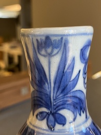 A Chinese blue and white double gourd vase with figures in a landscape, Transitional period