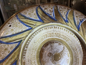 A large Hispano-Moresque lustre-glazed dish with a central bird medallion, Spain, 16th C.