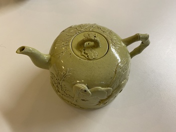 A Chinese yellow-glazed biscuit teapot, a white-glazed biscuit double gourd vase and an iron-red 'phoenix' jar, 20th C.