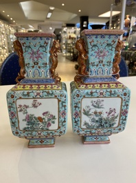 A pair of Chinese famille rose turquoise-ground vases, Qianlong mark, 19/20th C.