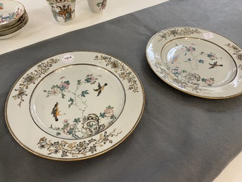 A pair of Chinese famille rose grisaille plates with birds among blossoming branches, Yongzheng/Qianlong