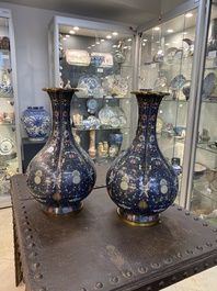 A pair of large Chinese cloisonn&eacute; 'bats and shou' bottle vases, 19th C.