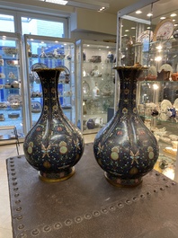 A pair of large Chinese cloisonn&eacute; 'bats and shou' bottle vases, 19th C.