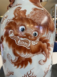 A pair of Chinese polychrome 'Buddhist lions' vases, 19th C.