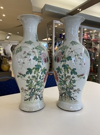 A pair of Chinese famille rose vases with floral design, Qianlong mark, 19/20th C.