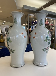 A pair of Chinese famille rose vases with floral design, Qianlong mark, 19/20th C.