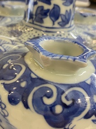 A pair of Chinese blue and white flower vases, 19th C.