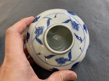 A pair of small Chinese blue and white covered vases on wooden stands, Xuande mark, 19/20th C.