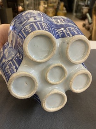 A pair of Chinese blue and white flower vases, 19th C.