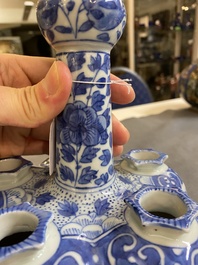 A pair of Chinese blue and white flower vases, 19th C.