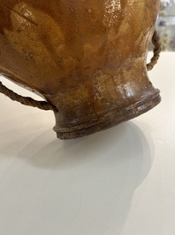 Two German stoneware bellarmine jugs and a pilgrim's flask, 17th C.