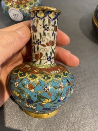 Three Chinese cloisonn&eacute; vases and a covered box, 19/20th C.