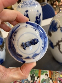 A pair of Chinese blue, white and copper-red vases, a blue and white covered vase and a Canton famille rose box and cover, 19/20th C.