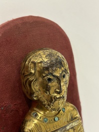 A large inlaid gilt copper applique of Saint Anthony, Limoges, France, 13th C. or later