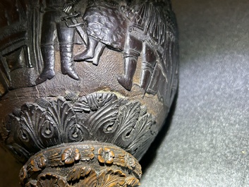 A Spanish colonial carved corozo and coconut marriage cup, probably Cuzco, Peru, 17th C.
