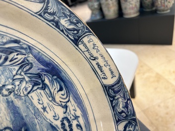 A Dutch Delft blue and white 'The abduction of Europa' dish, 1st quarter 18th C.