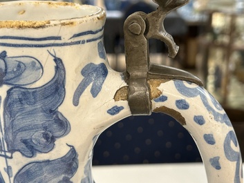 A large twisted Dutch Delft blue and white pewter-mounted ewer, 17th C.