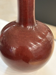 Two Chinese monochrome copper-red and peachbloom-glazed vases, 18/19th C.