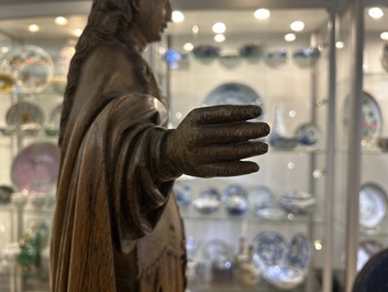 A large Flemish oak sculpture of Ursula with eight virgins, probably Malines, 16th C.