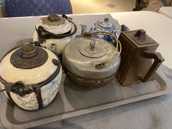 Two Vietnamese blue and white water pipes, a blue and white 'lotus' teapot, a Yixing teapot and a coconut teapot, Kangxi and later