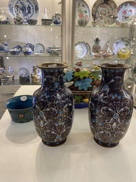 A pair of Chinese cloisonn&eacute; vases, a large covered box and a bowl, 19/20th C.