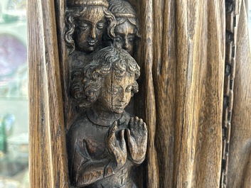 A large Flemish oak sculpture of Ursula with eight virgins, probably Malines, 16th C.